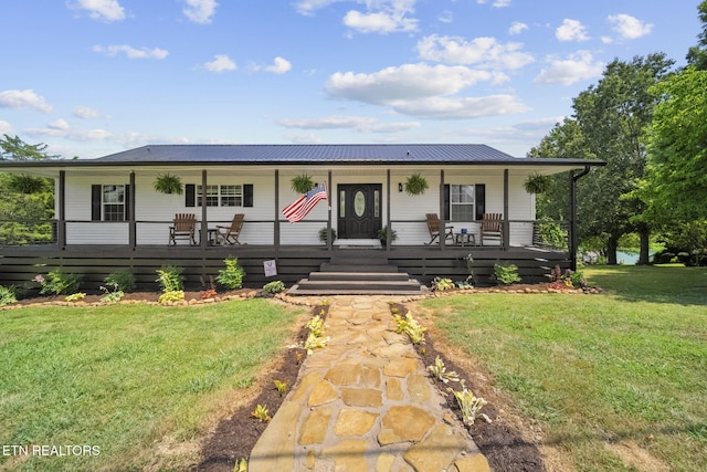 1033 Sunset View Rd, Sevierville, TN 37876 - view of front of home with a porch, a front lawn, and a metal roof