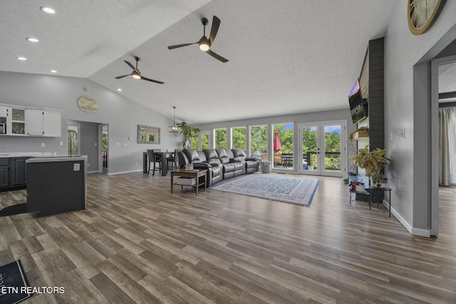 1033 Sunset View Rd, Sevierville, TN 37876 - living area featuring dark wood-style floors, a ceiling fan, a textured ceiling, recessed lighting, and high vaulted ceiling