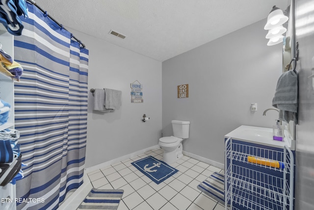 1033 Sunset View Rd, Sevierville, TN 37876 - full bathroom featuring vanity, a textured ceiling, tile patterned floors, and curtained shower