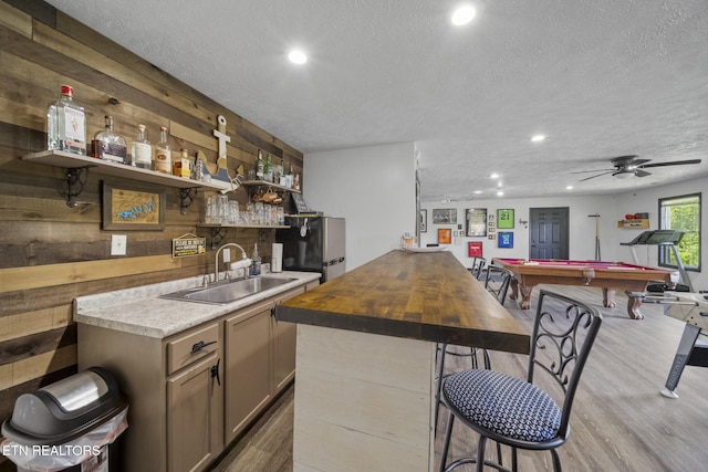 1033 Sunset View Rd, Sevierville, TN 37876 - indoor bar featuring freestanding refrigerator, wood finished floors, a textured ceiling, pool table, and recessed lighting