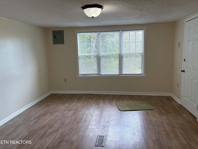 278 Buell Hill Rd, Pineville, KY 40977 - foyer featuring electric panel, wood finished floors, and a textured ceiling