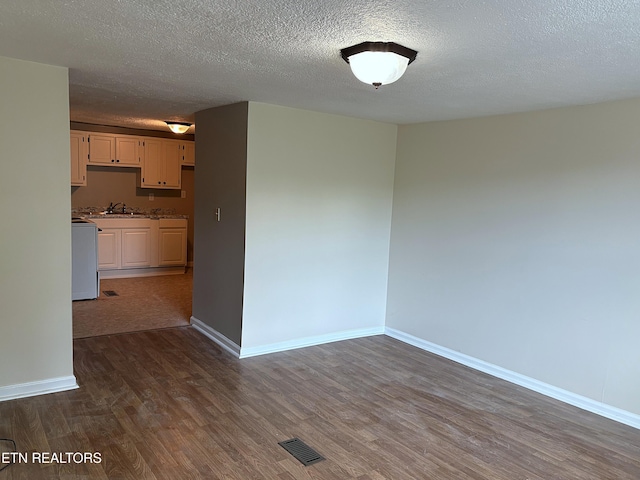 278 Buell Hill Rd, Pineville, KY 40977 - empty room featuring dark wood finished floors and a textured ceiling