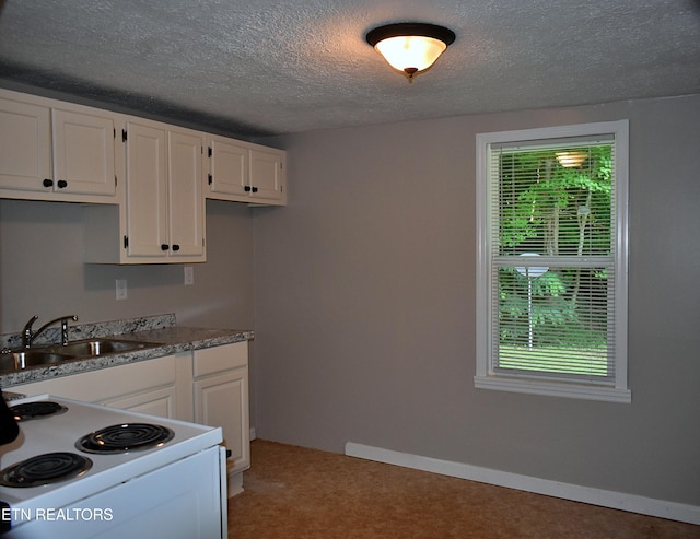 278 Buell Hill Rd, Pineville, KY 40977 - kitchen featuring white range with electric cooktop, white cabinets, a textured ceiling, carpet floors, and light countertops