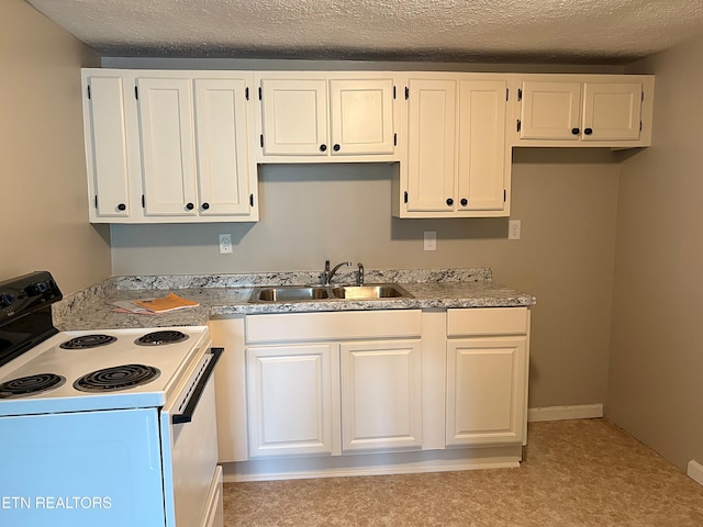 278 Buell Hill Rd, Pineville, KY 40977 - kitchen with white electric range oven, white cabinetry, light countertops, and a textured ceiling