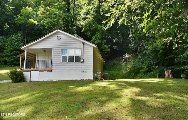 278 Buell Hill Rd, Pineville, KY 40977 - view of front of home with a front yard, crawl space, and a forest view