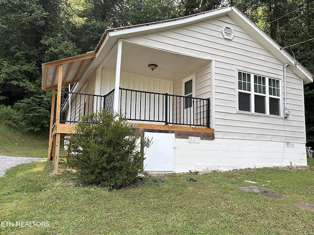 278 Buell Hill Rd, Pineville, KY 40977 - view of home's exterior with a yard and board and batten siding