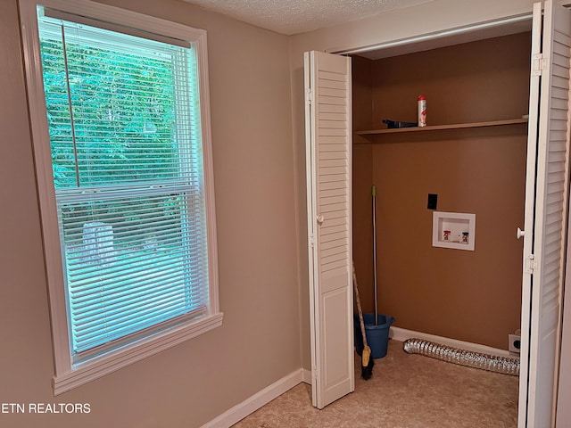 278 Buell Hill Rd, Pineville, KY 40977 - laundry room featuring washer hookup, light carpet, and a textured ceiling