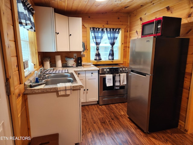 151 Stonewall Way, Cosby, TN 37722 - kitchen with appliances with stainless steel finishes, wooden ceiling, white cabinets, light countertops, and dark wood finished floors