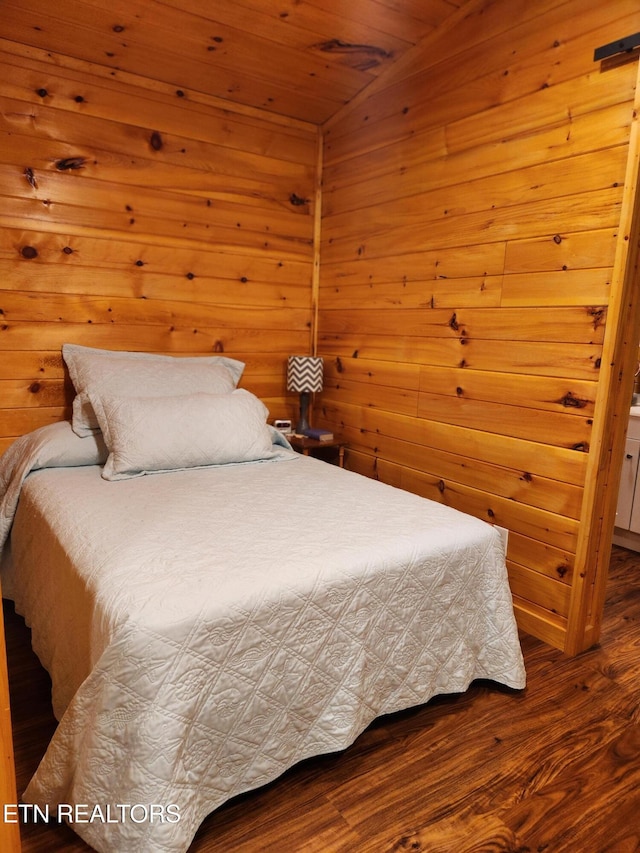 151 Stonewall Way, Cosby, TN 37722 - bedroom featuring lofted ceiling, wood finished floors, wooden ceiling, and wood walls