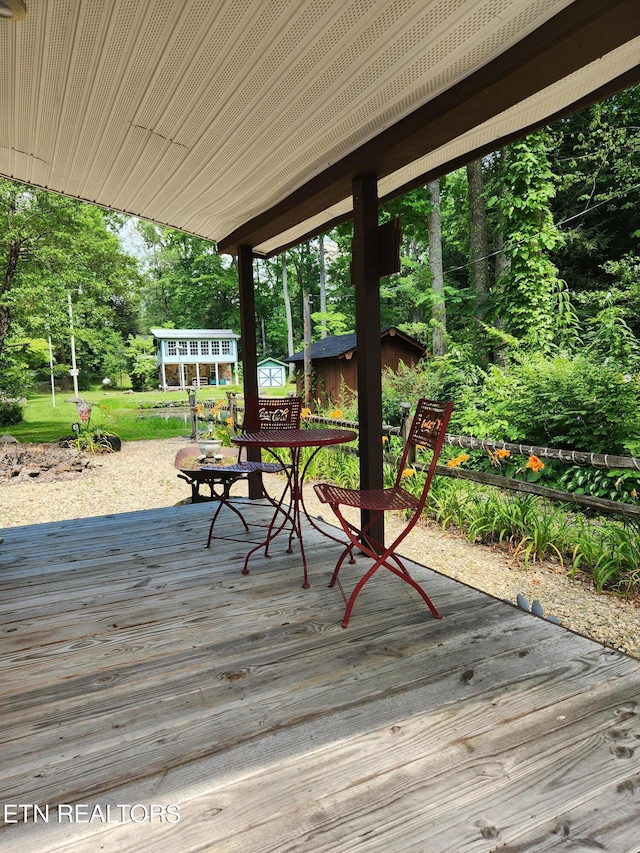 151 Stonewall Way, Cosby, TN 37722 - deck with a shed and outdoor dining area