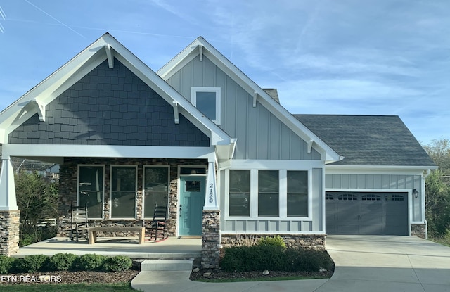 2130 Leah Ln, Maryville, TN 37803 - craftsman-style home with board and batten siding, a garage, covered porch, and driveway