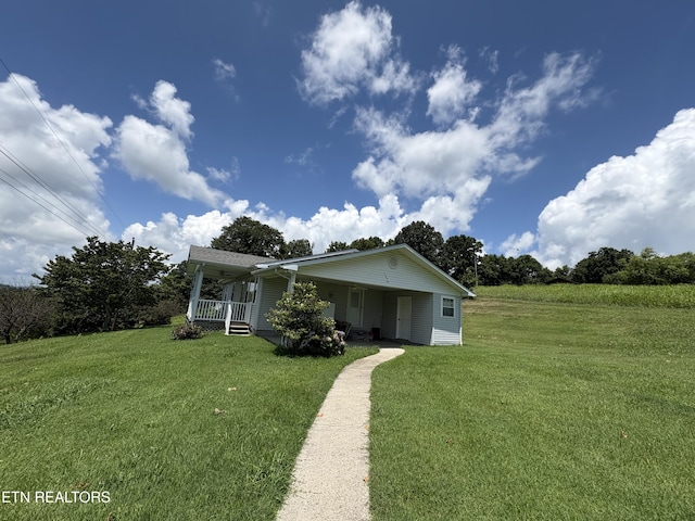 1370 Raven Hill Rd, Tazewell, TN 37879 - view of front of home featuring covered porch and a front yard