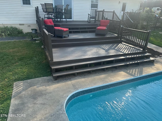 8024 Sharp Rd, Powell, TN 37849 - swimming pool featuring a wooden deck and a lawn