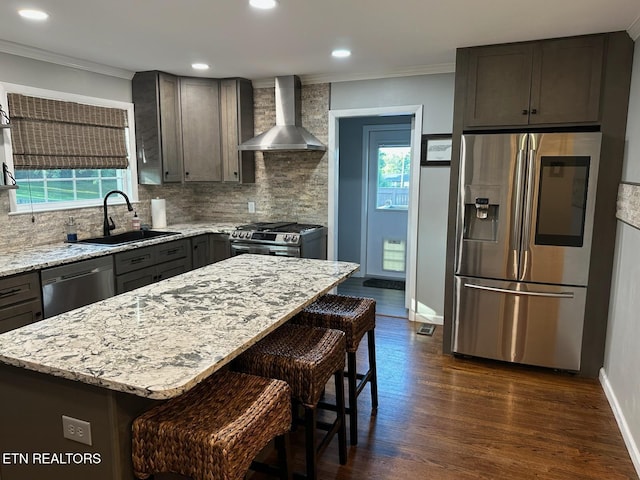 8024 Sharp Rd, Powell, TN 37849 - kitchen with wall chimney range hood, stainless steel appliances, plenty of natural light, light stone counters, and crown molding