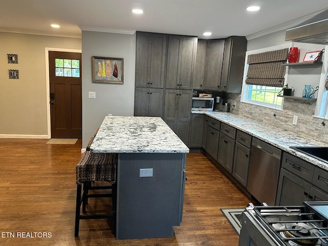 8024 Sharp Rd, Powell, TN 37849 - kitchen featuring stainless steel appliances, ornamental molding, a center island, a breakfast bar, and recessed lighting