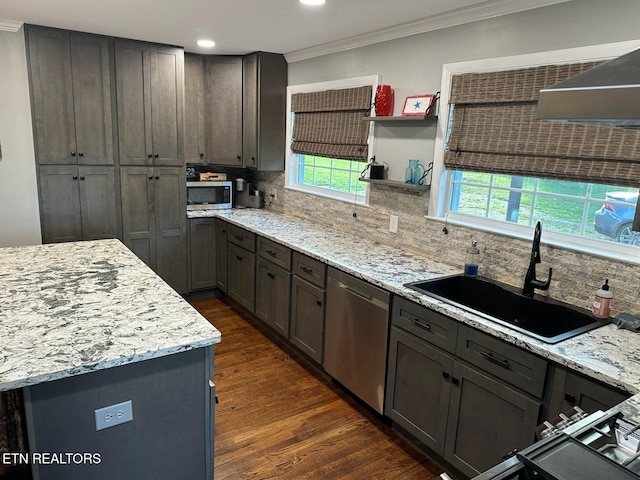 8024 Sharp Rd, Powell, TN 37849 - kitchen featuring stainless steel appliances, crown molding, dark wood-type flooring, decorative backsplash, and light stone counters
