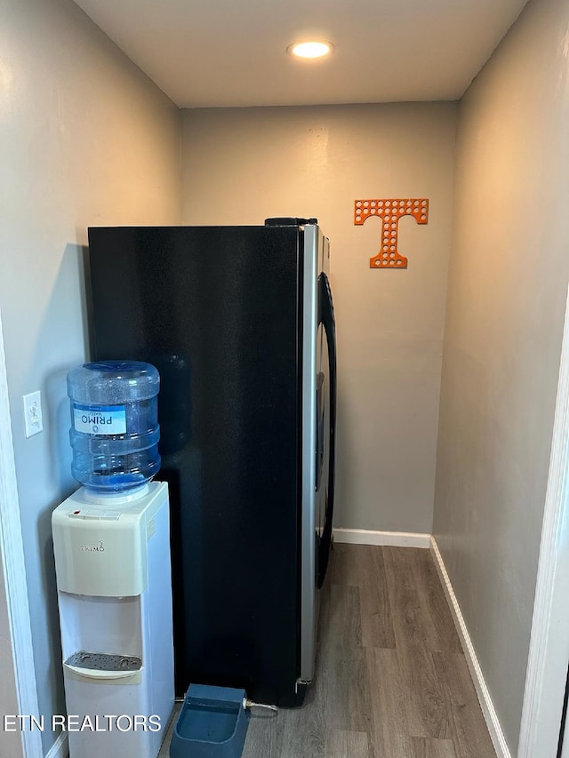 8024 Sharp Rd, Powell, TN 37849 - laundry view of wood finished floors, freestanding refrigerator, and recessed lighting