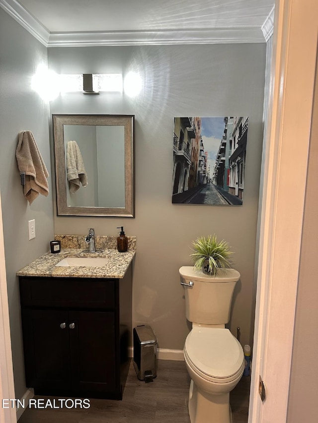 8024 Sharp Rd, Powell, TN 37849 - bathroom with crown molding, vanity, and wood finished floors
