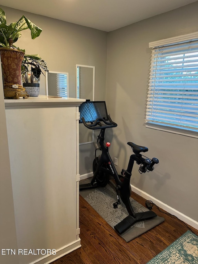 8024 Sharp Rd, Powell, TN 37849 - exercise room with wood finished floors and baseboards
