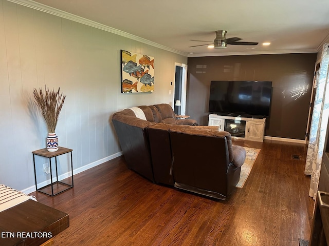 8024 Sharp Rd, Powell, TN 37849 - living room with dark wood-style floors, a ceiling fan, crown molding, recessed lighting, and a glass covered fireplace
