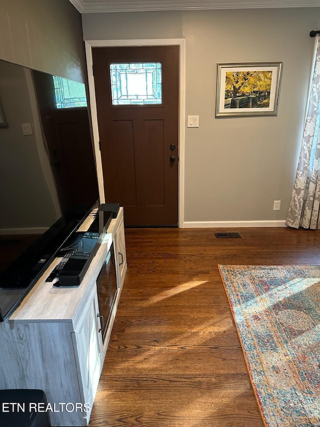 8024 Sharp Rd, Powell, TN 37849 - entrance foyer with ornamental molding and dark wood-style floors