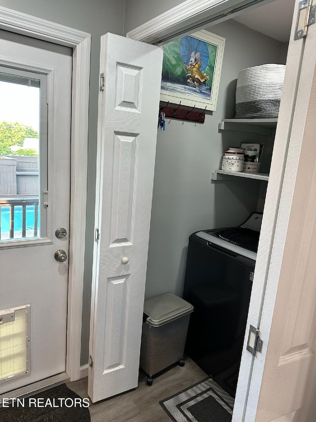 8024 Sharp Rd, Powell, TN 37849 - laundry area featuring washer / dryer and wood finished floors