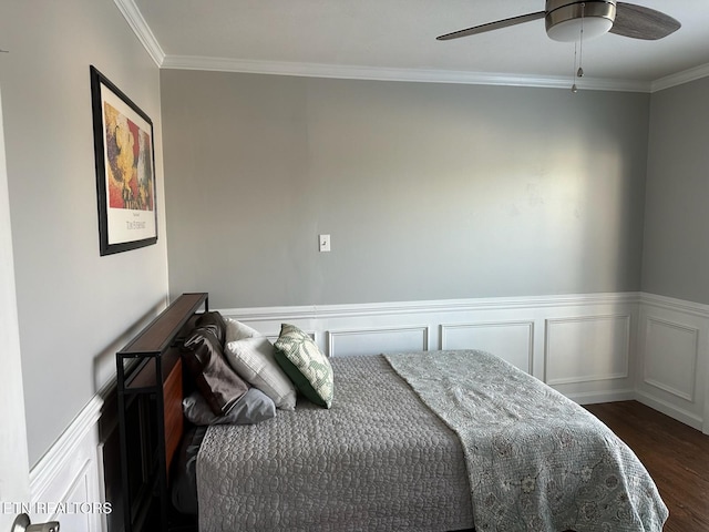 8024 Sharp Rd, Powell, TN 37849 - bedroom with dark wood-style flooring, crown molding, wainscoting, ceiling fan, and a decorative wall