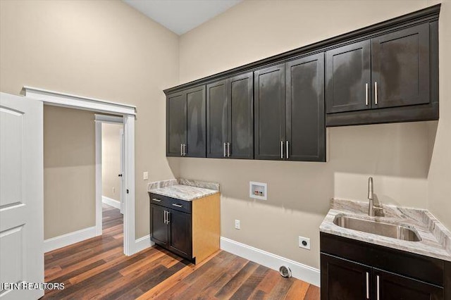 455 Sunset Harbor Dr, Dandridge, TN 37725 - laundry room with washer hookup, cabinet space, dark wood-type flooring, and electric dryer hookup