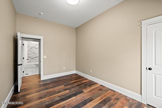 455 Sunset Harbor Dr, Dandridge, TN 37725 - spare room featuring baseboards and dark wood-style floors