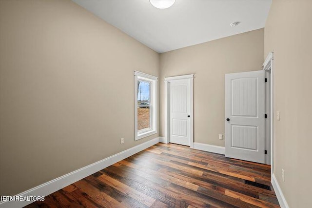 455 Sunset Harbor Dr, Dandridge, TN 37725 - unfurnished bedroom featuring wood finished floors and baseboards