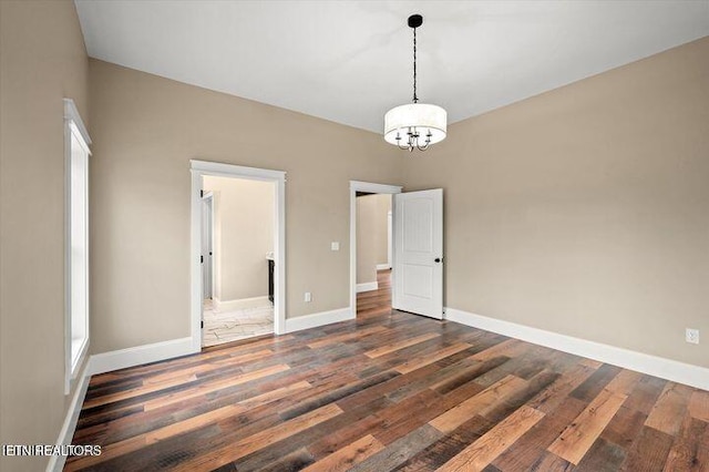 455 Sunset Harbor Dr, Dandridge, TN 37725 - empty room featuring wood finished floors and a chandelier