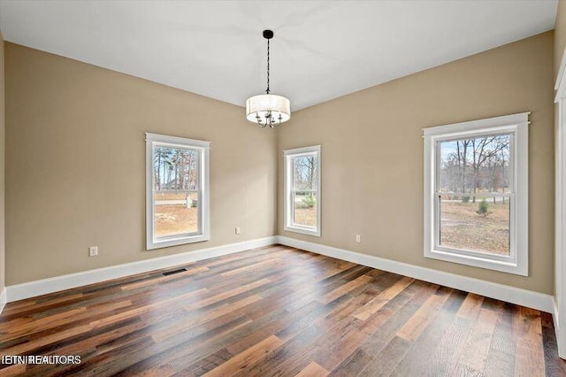 455 Sunset Harbor Dr, Dandridge, TN 37725 - unfurnished room featuring dark wood finished floors and a chandelier