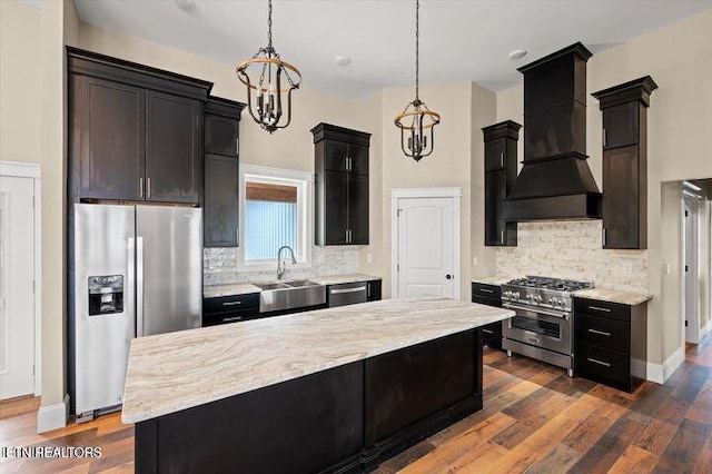 455 Sunset Harbor Dr, Dandridge, TN 37725 - kitchen featuring stainless steel appliances, custom exhaust hood, a chandelier, tasteful backsplash, and dark wood-style floors