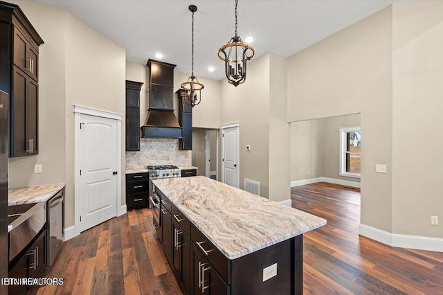 455 Sunset Harbor Dr, Dandridge, TN 37725 - kitchen with premium range hood, stainless steel dishwasher, dark wood-type flooring, a towering ceiling, and a center island