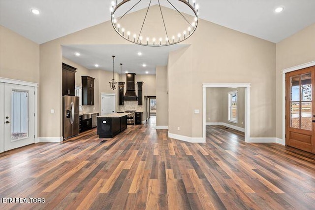 455 Sunset Harbor Dr, Dandridge, TN 37725 - kitchen with stainless steel fridge with ice dispenser, open floor plan, premium range hood, high vaulted ceiling, and light countertops