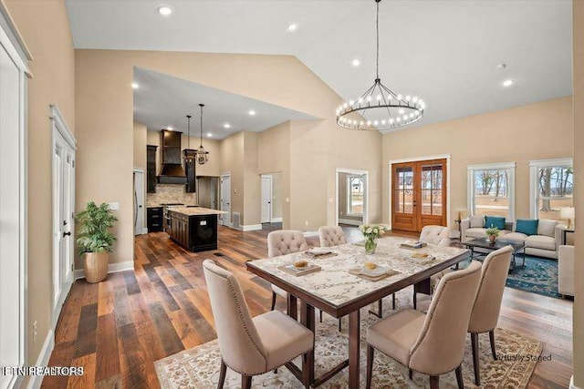 455 Sunset Harbor Dr, Dandridge, TN 37725 - dining space with high vaulted ceiling, dark wood-type flooring, and a chandelier