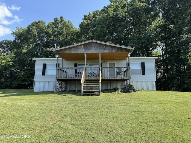 Ousley Crst, Cumberland Gap, TN 37724 - rear view of property featuring stairs, a lawn, and a wooden deck