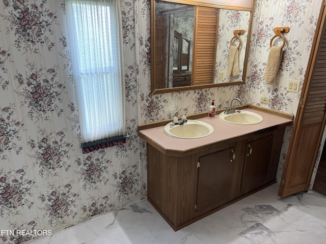Ousley Crst, Cumberland Gap, TN 37724 - bathroom with double vanity, wallpapered walls, and marble finish floors