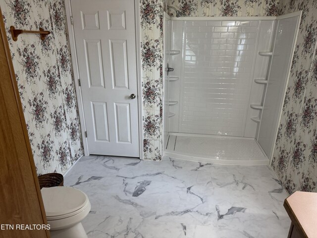 Ousley Crst, Cumberland Gap, TN 37724 - bathroom featuring wallpapered walls, a stall shower, vanity, and marble finish flooring