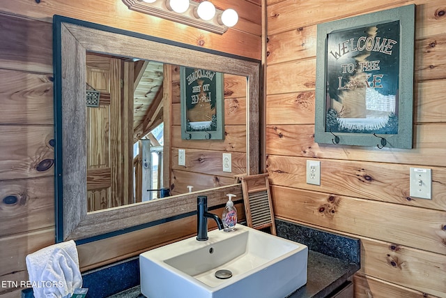3012 Oak Tree Way, Pigeon Forge, TN 37863 - bathroom with a sink and wood walls