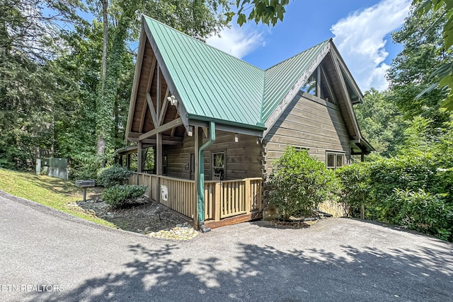3012 Oak Tree Way, Pigeon Forge, TN 37863 - view of front of property with a metal roof and covered porch