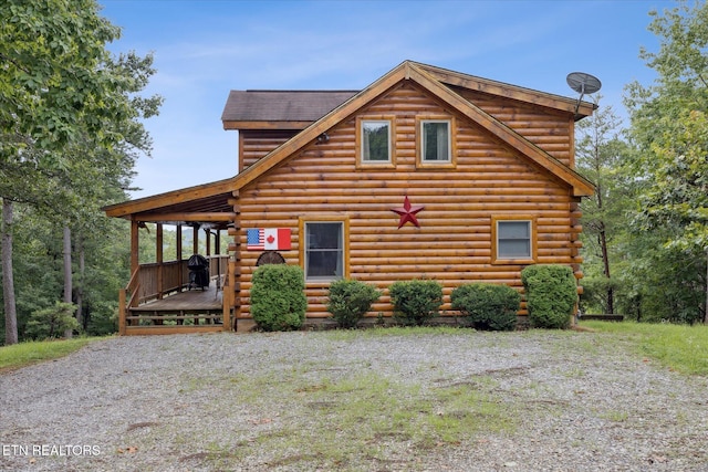 1818 Saddle Way, Sevierville, TN 37876 - log home featuring a wooden deck and log exterior