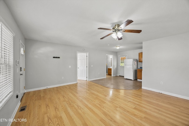 710 E Fir St, Lafollette, TN 37766 - unfurnished living room featuring ceiling fan and light wood finished floors