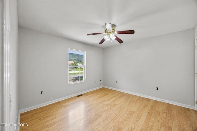 710 E Fir St, Lafollette, TN 37766 - spare room with a ceiling fan and light wood-style flooring