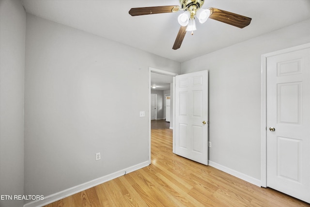 710 E Fir St, Lafollette, TN 37766 - unfurnished bedroom featuring light wood finished floors and a ceiling fan