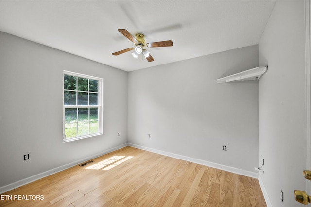 710 E Fir St, Lafollette, TN 37766 - spare room featuring a ceiling fan and light wood-style floors