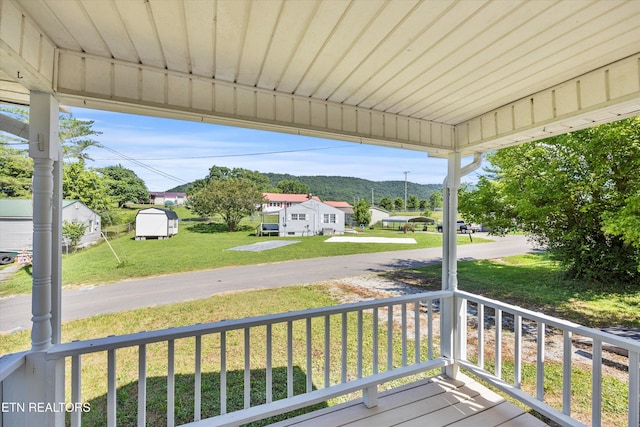 710 E Fir St, Lafollette, TN 37766 - porch with a mountain view, a residential view, and a lawn