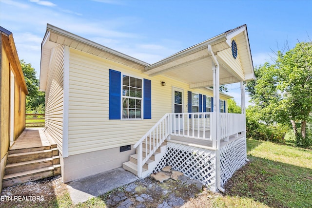 710 E Fir St, Lafollette, TN 37766 - view of front of home with crawl space and covered porch