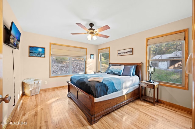 836 Sandra Way, Kodak, TN 37764 - bedroom with wood-type flooring and a ceiling fan