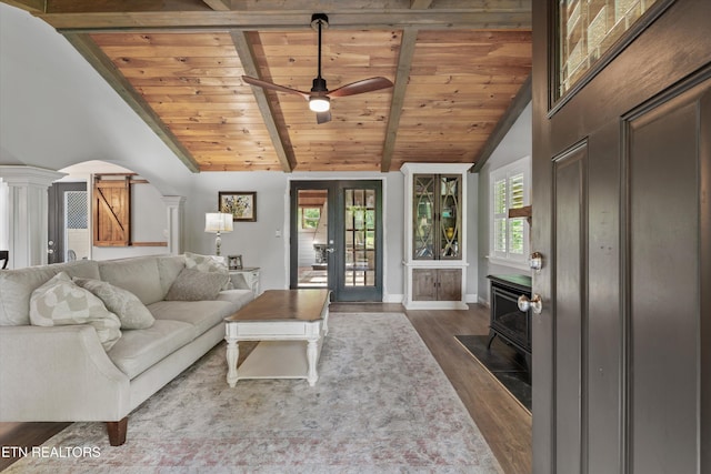 976 Lone Rd, Pioneer, TN 37847 - living area featuring wood ceiling, healthy amount of natural light, ornate columns, wood finished floors, and ceiling fan